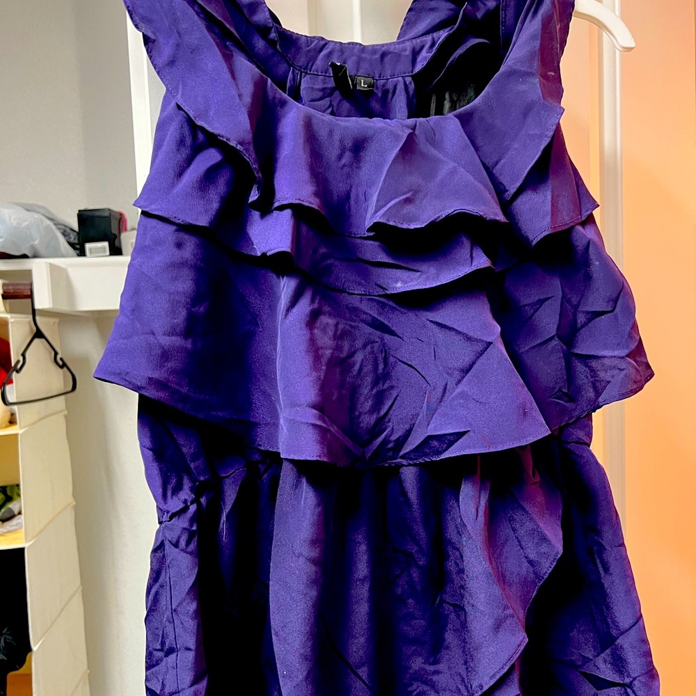 Purple ruffled halter top. Great blouse to pair with a blazer.